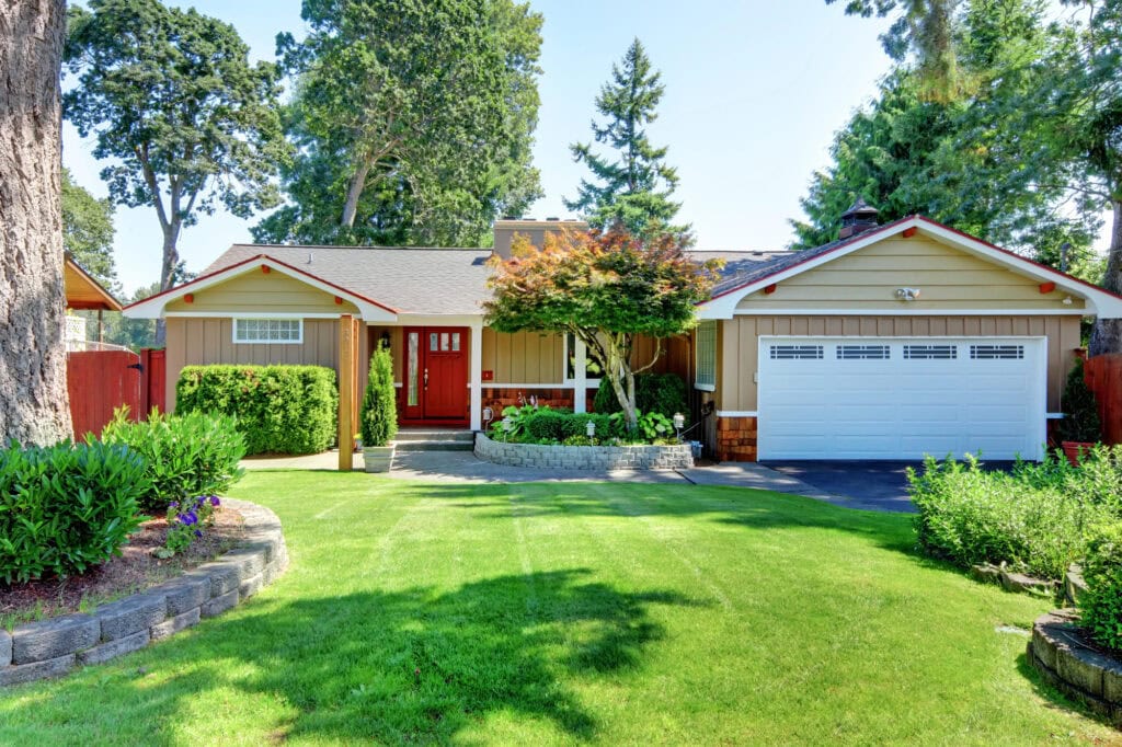 picture of a suburban ranch house for the article how to make $20,000 a month with rental property